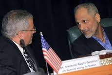 Scott (left) meeting with Sudan's negotiator, Dr. Ghazi Salahuddin Atabani.